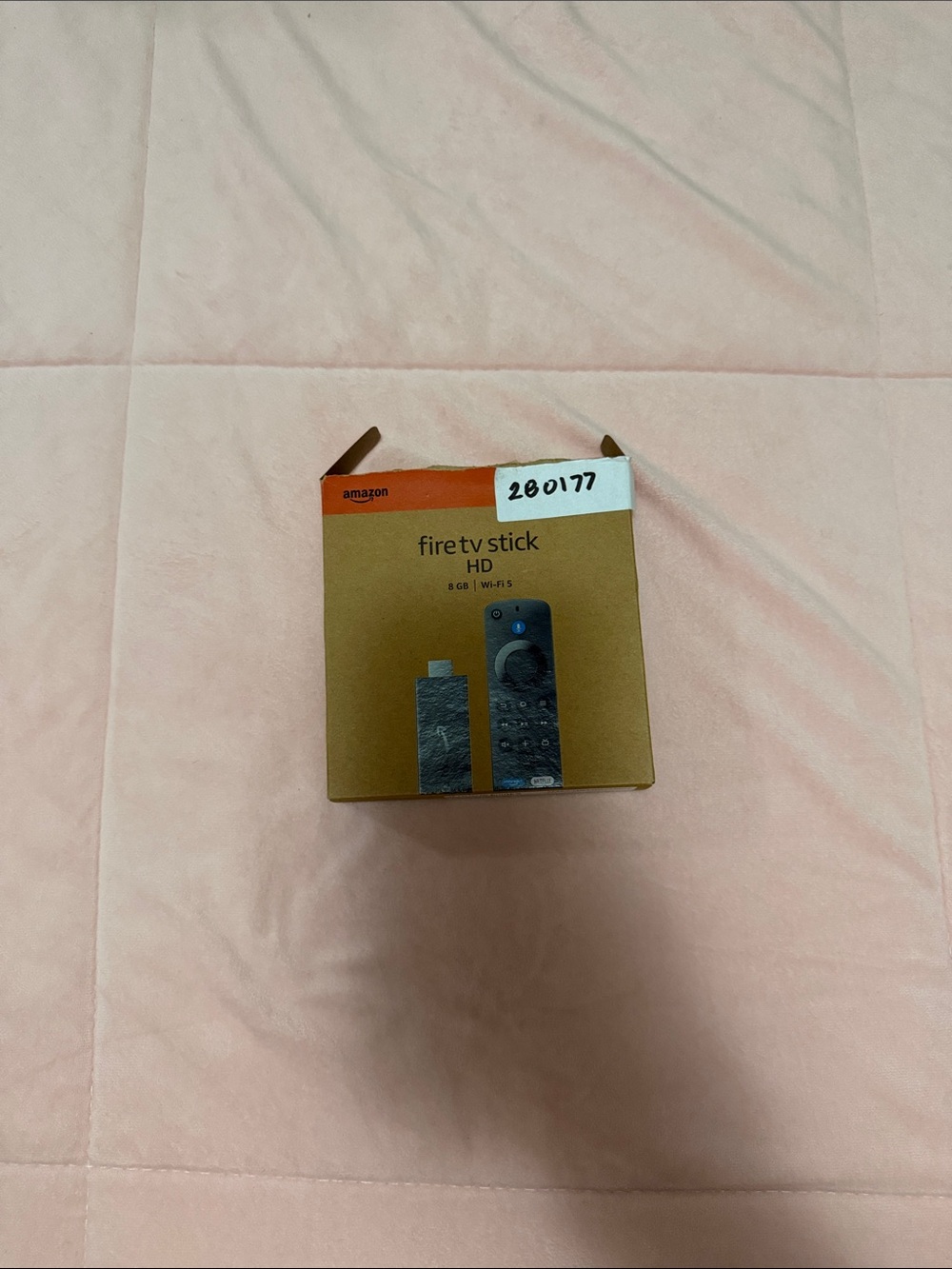 Amazon Fire TV Stick HD - Brown Box with Black Remote Graphic